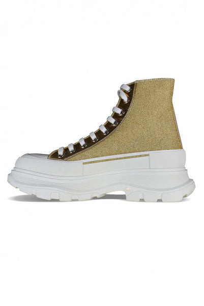 Close-up of Alexander McQueen athletic hardware and fine stitching