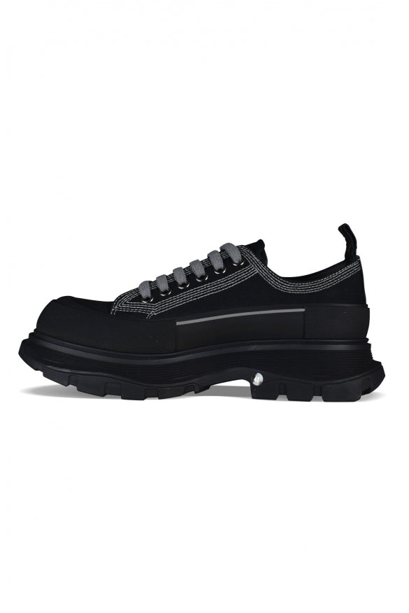Alexander McQueen athletic side profile designer luxury fashion