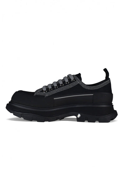 Alexander McQueen athletic side profile designer luxury fashion