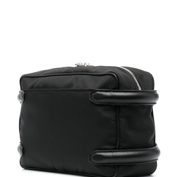 Alexander McQueen premium cross body bags detail and craftsmanship close-up