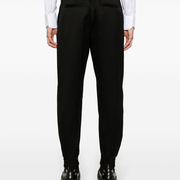 Alexander McQueen premium pants detail and craftsmanship close-up