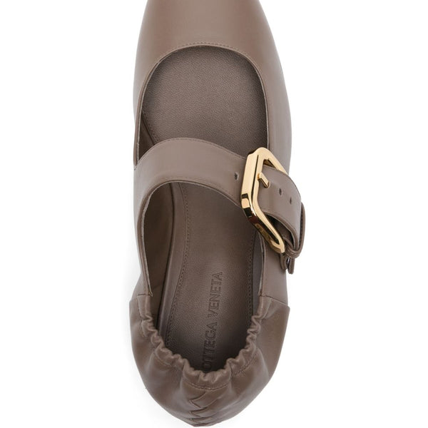 Close-up of Bottega Veneta flats hardware and fine stitching