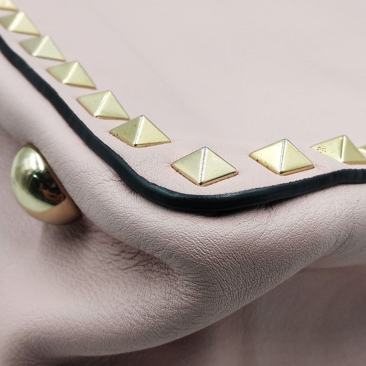 Close-up of Medium bags hardware and fine stitching
